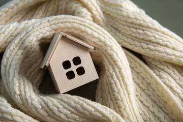 Immagine: cozy-house-concept-with-wooden-toy-house