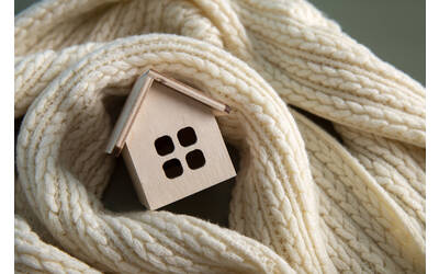 Immagine: cozy-house-concept-with-wooden-toy-house